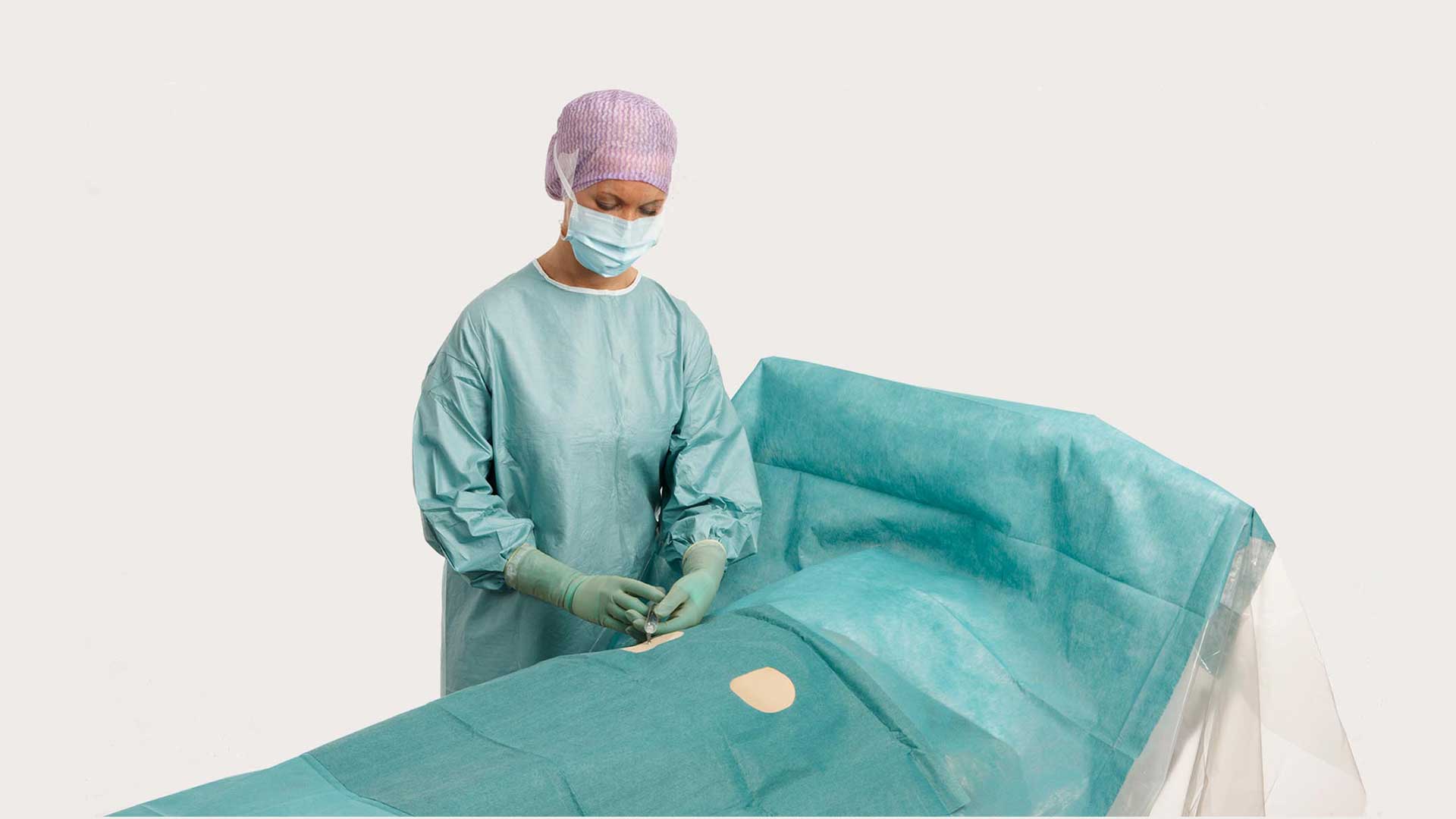 kirurg med BARRIER oppdekking for angiografi til operasjon